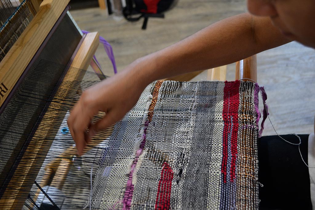 Nikita weaving cloth
